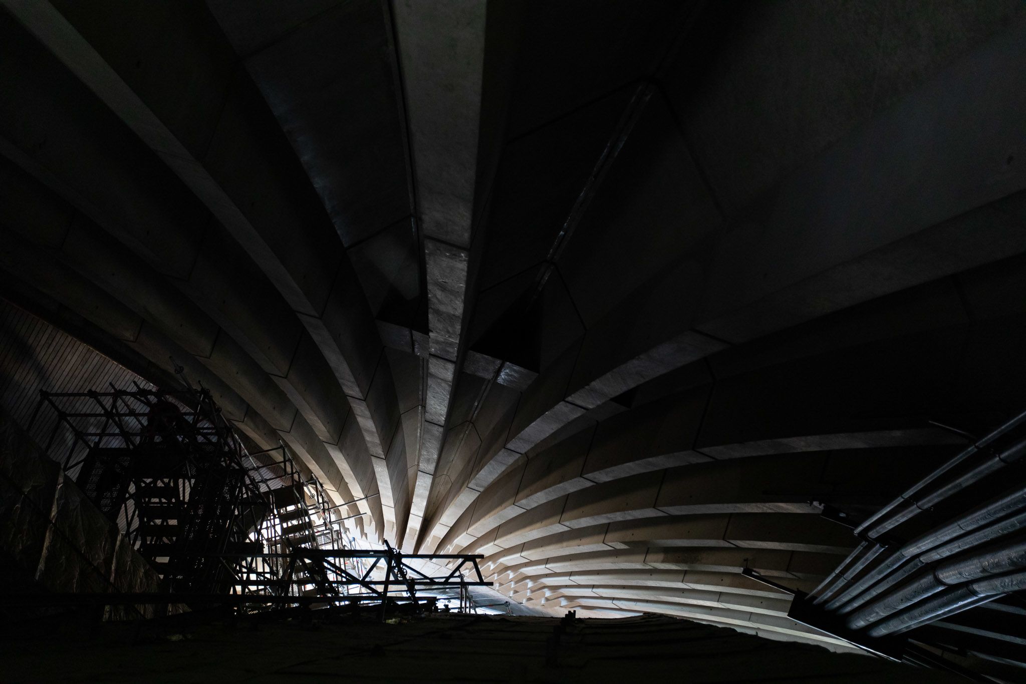 Dark internal shot of Opera House sails