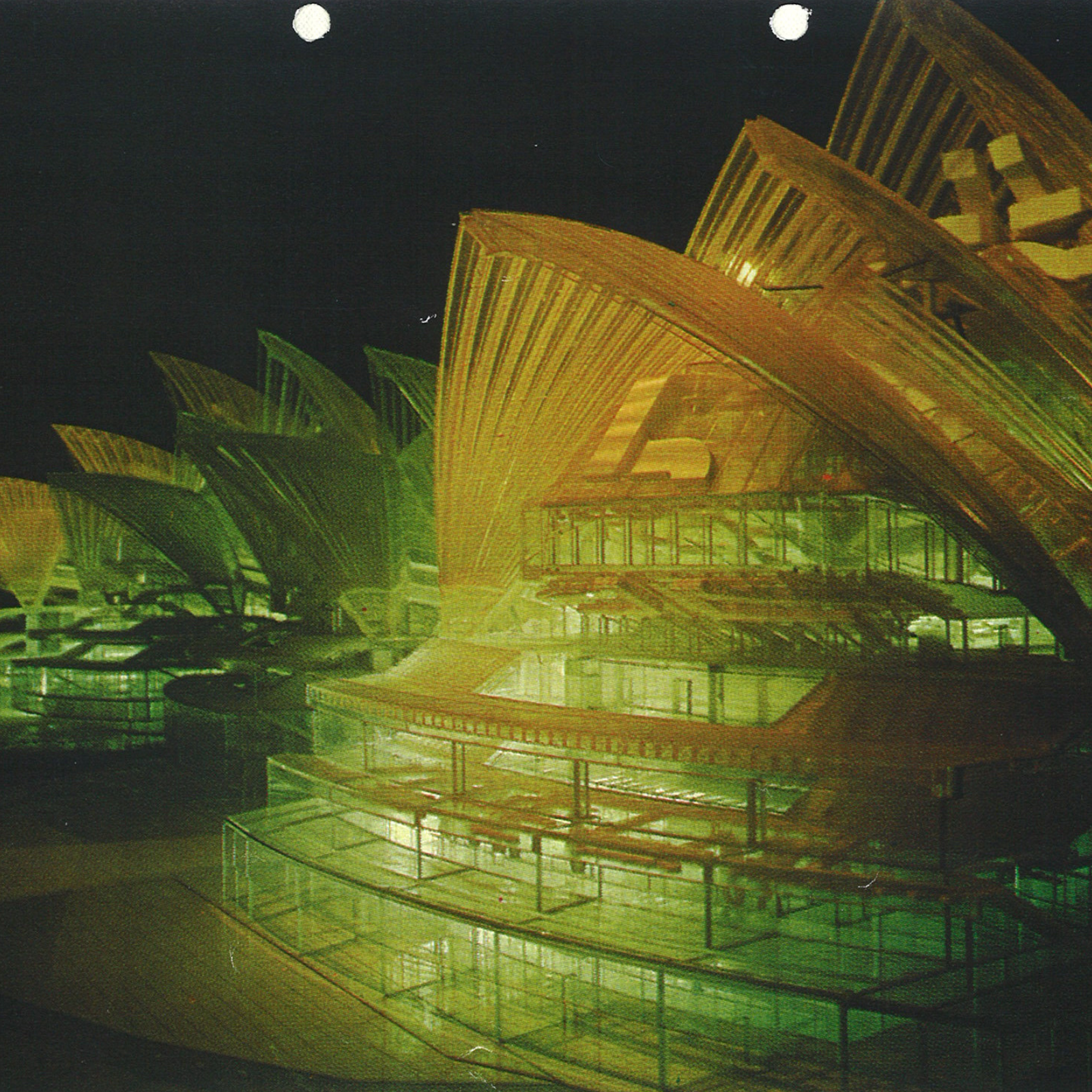 A dark, infrared photo shows the intricate insides of the model